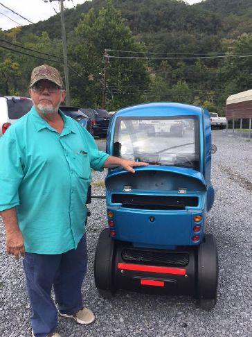 Johnny And Hinton Residents Enjoy The Look Of This Electric Car