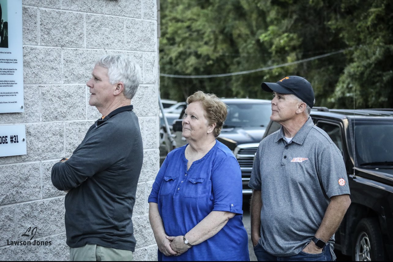 Children of Pat Shires: Kevin, Cathy, and Pat Jr. admire the new signage at Garten Stadium.