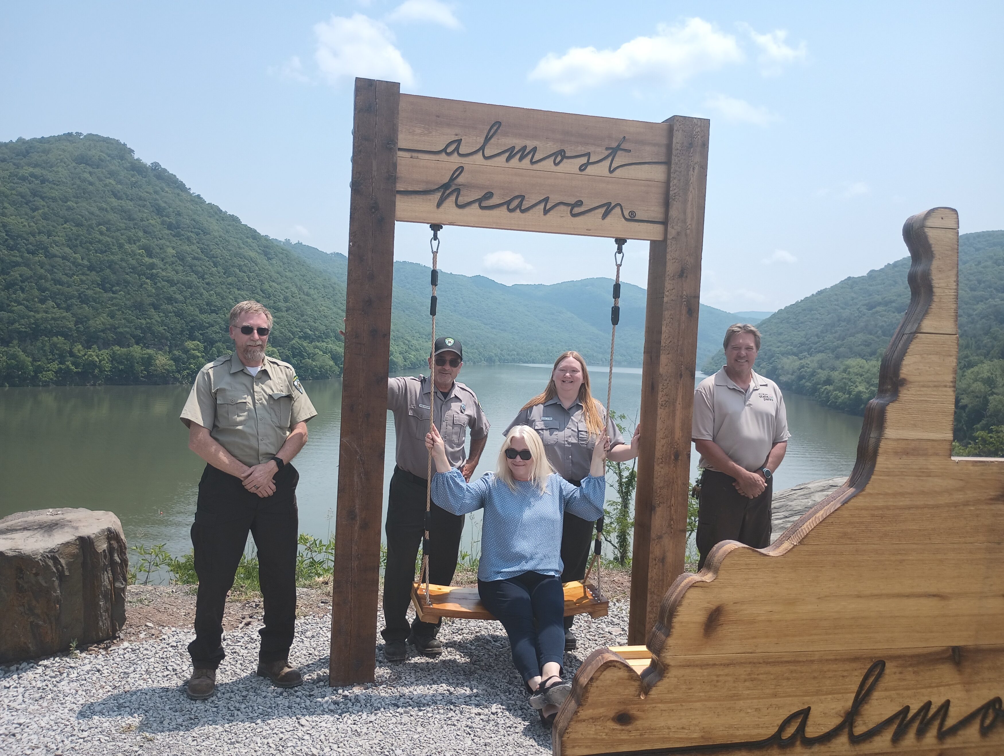 CVB Executive Director Rebecca Peterson with Park staff