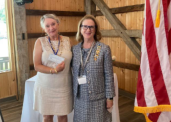 Left to Right: Margaret Hambrick, Greenbrier Historical Society accepts a donation on behalf of the Friends the Blue Sulphur Spring Pavilion from Suzanne Cronquist representing the NSDAR Southern WV District.