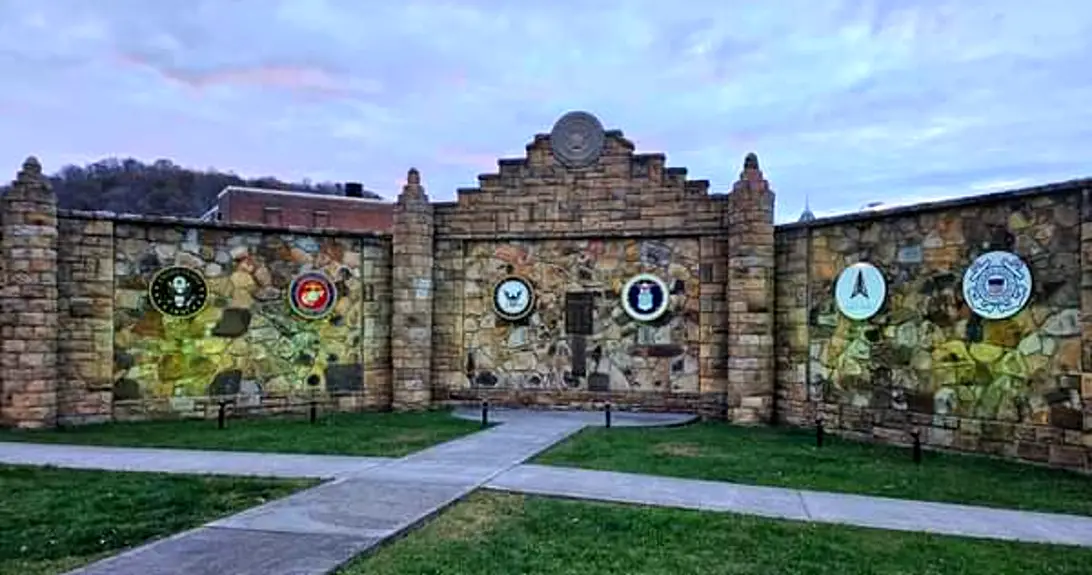 Veteran's Memorial Wall goes green in support for veterans The Hinton