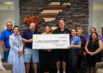 McDonald’s Owner/Operator Chris Connolly presents RMHC® of Southern West Virginia Executive Director Brooke Field a check for $15,939.76. The money was raised during the RMHC Digital Day on August 8. McDonald’s Owner/Operators donated 20 percent of all sales purchased through the McDonald’s app. Pictured (left-right) Thomas Epps, Dr. Youmna Mousattat, Chris Connolly, Brooke Field, Craig Allison, Sarah Miller, Kerri Vanderbilt, Jennifer England, and Ellen Slotnick.