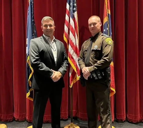 JC Wheeler (right) at the conference. Photo courtesy of WVDNR Facebook