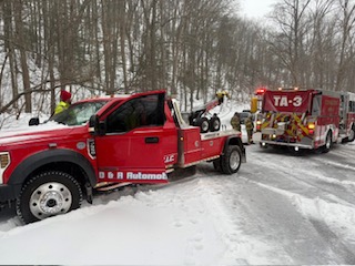D&R Automotive among all area tow trucks stayed busy Sunday. D&R was called to assist the Covington Fire Department that was enroute to a structure fire. Photo: Dewey Perkins Jr.