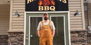 Brad McDaniel in front of Hawg Jaw BBQ