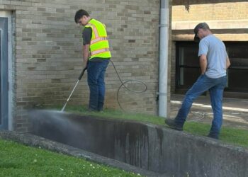 Maintenance workers pressure washing (Photo: Summers County Schools)