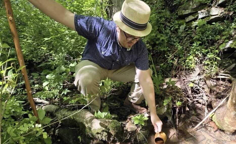 Me tasting the magnesia spring