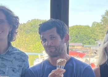 The New River Expedition Crew.  L-R:  Anastasia Jeffcoat, Abbey Mays, Dave Bernier, Ann Rose, and Lucy Bolin enjoying one of many ice creams they have had on their journey at Mountain2Island Marina on Claytor Lake, VA.