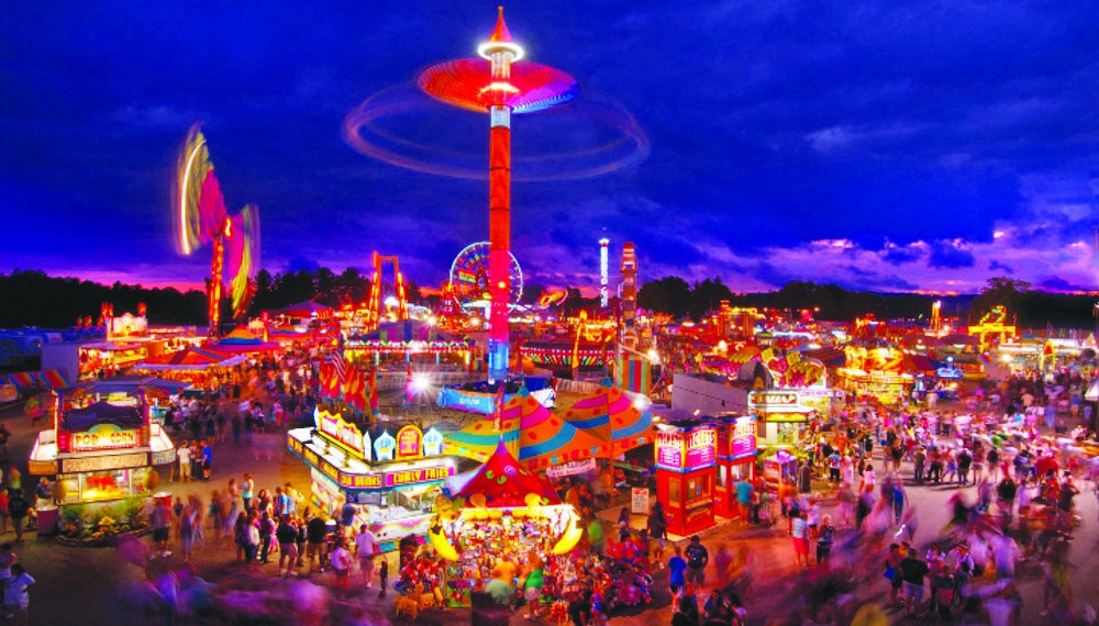 Photo of the carnival area after dark. Photo provided by The State Fair of West Virginia media resources.