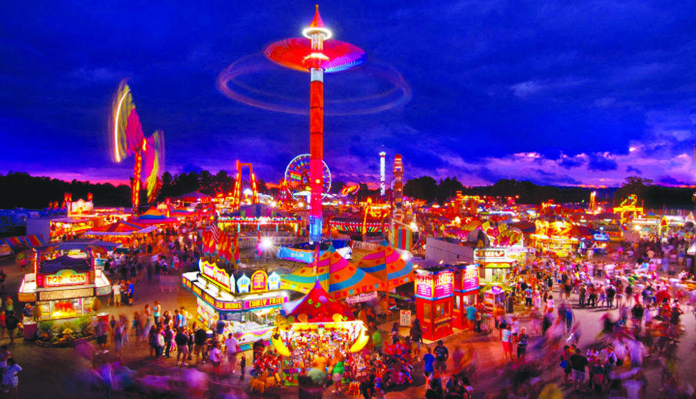 Photo of the carnival area after dark. Photo provided by The State Fair of West Virginia media resources.